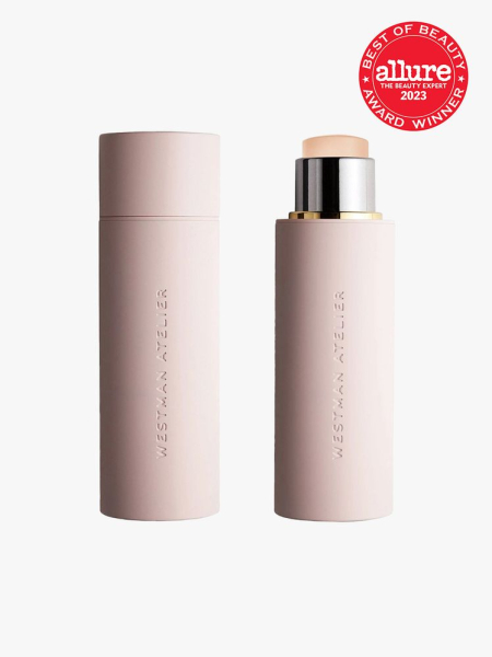 Westman Atelier Vital Skin Foundation Stick light pink twist up foundation stick on light gray background with red Allure Best of Beauty seal in the top right corner